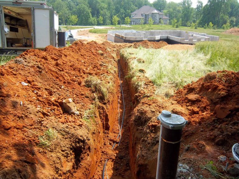 Trenching And Laying Pipe And Wire From A Water Well To A New Home