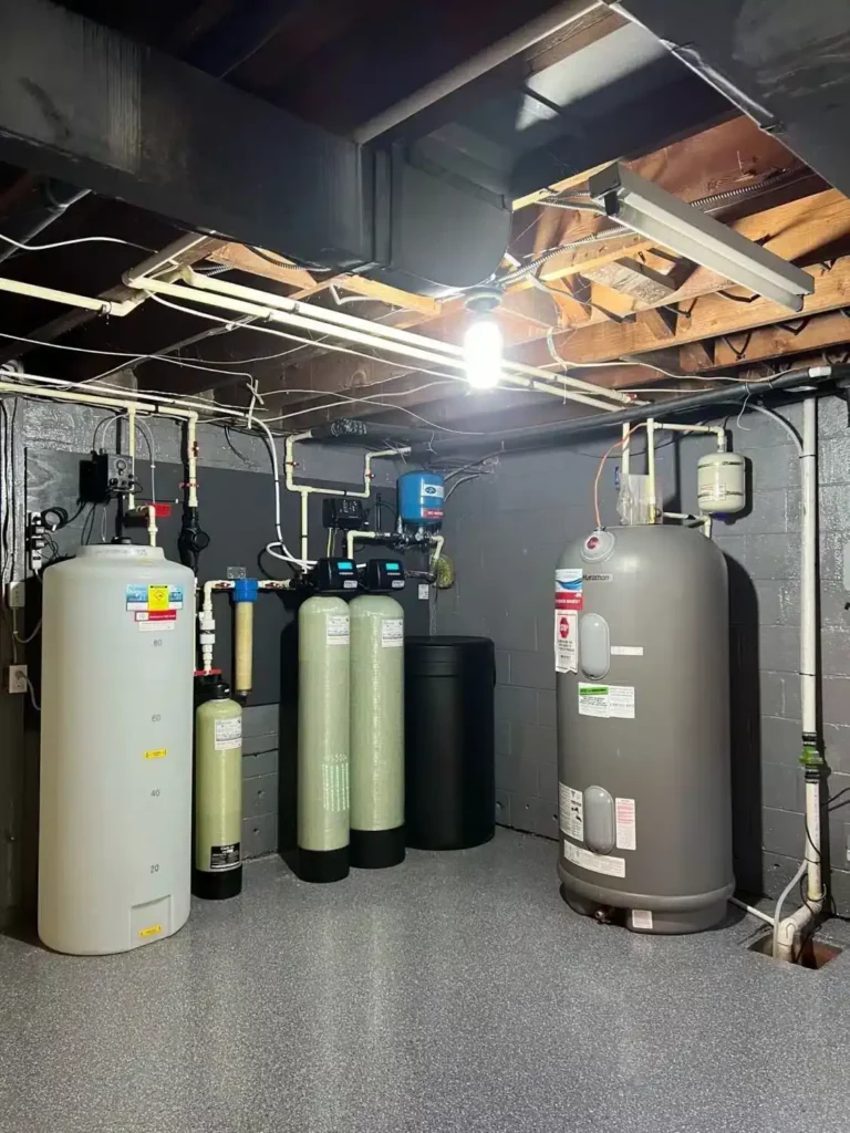 A Room With Several Large Tanks Showcasing Water Treatment System Install &Amp; Service