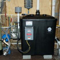Radon in Water Remediation System with a water pressure booster pump and other treatment