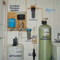 Whole House Water Treatment. A Solution Feeder for pH & corrosion control, a Carbon Tank for the remediation of cancer causing radon in water, a Pre- Treatment & Post-Treatment Whole House Sediment Filter and a Constant Water Pressure Well Pump Control System.