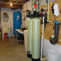Well Water Pressure Tank, a Water Softener with Brine Tank , an Acid Neutralizer and a Whole House Sediment Filter