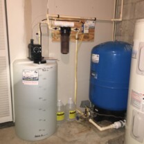 A Solution Feeder Pump and Solution Tank for pH and corrosion control, a Whole House Sediment Filter, a Pressure Tank and a Water Heater
