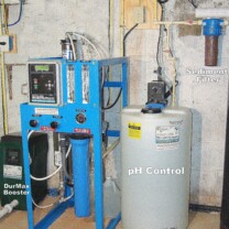 Whole House Commercial Grade Reverse Osmosis System for up too 99.9% contaminant free water with a water pressure booster pump, a Solution Feeder for corrosion and pH control & a sediment filter