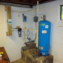 An Ultra-Violet Water Remediation System to remove 99.9% of all bacteria from water, a Whole House Sediment Filter, a Well Water Pressure Tank and a Well Water Pump Control Box