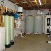 A Water Softener for hard water, an Acid Neutralizer for pH & corrosion control, a Well Pump Constant Water Pressure System, a Reverse Osmosis for 99.9% containment free cooking and drinking water and Water Storage Tanks with a pressure Re-Booster