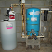 A Solution Feeder and Solution Tank for pH and corrosion control, a Pressure Tank and a Whole House Sediment Filter