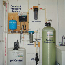 A Solution Feeder and Solution Tank for pH and corrosion control, a Constant Water Pressure System, a pre and post treatment Sediment Filter and a Radon Reduction System for the remediation of cancer causing radon in water