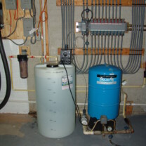 A Solution Feeder Pump and Solution Tank for pH and corrosion control, A Pressure Tank and a Whole House Sediment Filter