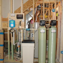 A Constant Water Pressure System, a Water Softener and Brine tank for hard water and an Acid Neutralizer for pH and corrosion control