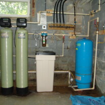 A Multi-Media Tank, a Water Softener, A Whole House Sediment Filter, a Pressure Tank and an Ultraviolet Light for the disinfection of bacteria and virus' in water