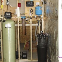 An Acid Neutralizer, a Whole House Sediment Filter, a Constant Water Pressure System and a Sediment Irrigation Filter