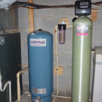 A Pressure Tank, a Whole House Sediment Filter and an Acid Neutralizer