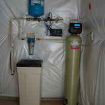 a water softener, a sediment filter and a constant pressure system