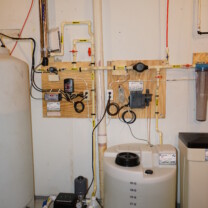 A Solution Feeder dosing Pump with Solution Tank for pH & corrosion control & an Ultra-Violet System to remove all bacteria from water