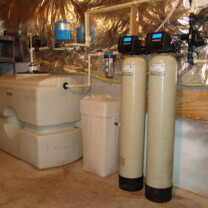 Water Storage Tanks, Constant Water Pressure System, a Whole House Sediment Filter, Water Softener and Brine Tank, Iron and Sulfur Breaker