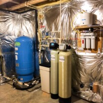 Raised Pressure Tank, a water softener, acid neutralizer and a reverse osmosis
