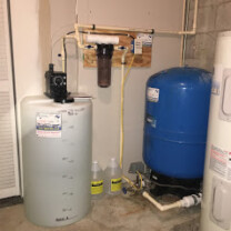 Solution feeder, sediment filter and a pressure tank