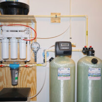 a water softener, a reverse osmosis, a sediment filter and a carbon tank