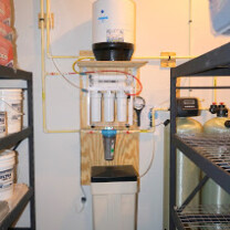 a reverse osmosis, a sediment feeder, a water softener and a carbon filter