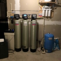 a water softener, a sediment filter, an acid neutralizer, a multimedia tank, a reverse osmosis and a pressure tank