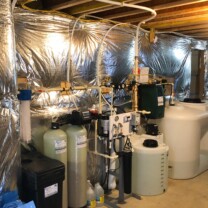 We installed a Whole House Reverse Osmosis System for up to 99.9% contamination free water, a Solution Feeder Pump with a 55 gallon Solution tank for pH and Corrosion control, a 20 inch Whole House Sediment Filter, 300 gallon clean water storage with a water pressure re-booster with a flood protection alarm, and a Twin Water Softener with a Brine Tank for hard water for a happy customer located in Westminster, Maryland! Whole House Reverse Osmosis System, Water Softener with Brine Tank, Sediment Filter, Solution Feeder Pump and Solution Mixing Tank, Clean Water Storage Tank and water pressure Booster