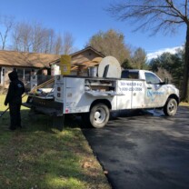 pump crew pulling a well pump
