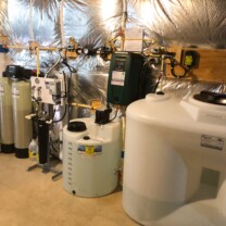 We installed a Whole House Reverse Osmosis System for up to 99.9% contamination free water, a Solution Feeder Pump with a 55 gallon Solution tank for pH and Corrosion control, a 20 inch Whole House Sediment Filter, 300 gallon clean water storage with a water pressure re-booster with a flood protection alarm, and a Twin Water Softener with a Brine Tank for hard water for a happy customer located in Westminster, Maryland! Whole House Reverse Osmosis System, Water Softener with Brine Tank, Sediment Filter, Solution Feeder Pump and Solution Mixing Tank, Clean Water Storage Tank and water pressure Booster