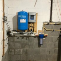 After shot! This repair consisted of removing the customers old equipment and replacing it with a new Franklin Subdrive Constant Water Pressure System and a new Whole House Sediment Filter! Constant Water Pressure System and Sediment Filter