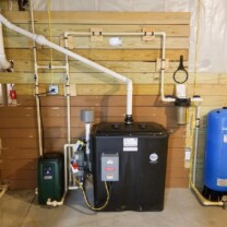 a radon remediation with a pressure booster, a sediment filter and a pressure tank