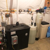 a radon remediation system, a Solution feeder, a sediment filter and a water softener