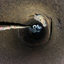 Looking down a water well