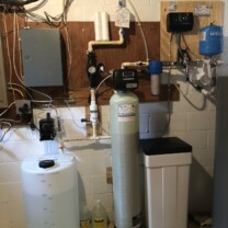a Solution feeder, static mixer, water softener with a brine tank, a sediment filter and a constant pressure system