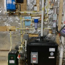 a radon remediation system with a pressure booster, a sump pump and a constant pressure system