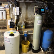 a reverse osmosis, a Solution feeder, a sediment filter, a multimedia tank and a pressure tank