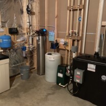 Stainless Steel Water Softener for hard water, Radon removal system with a water pressure booster, a Solution feeder for ph control, a sediment filter and a constant pressure system