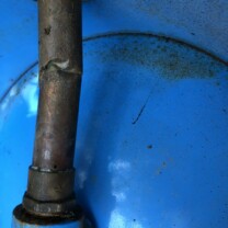 corroded pressure tank tee