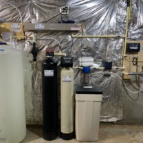 Water Treatment including a Solution Feeder, water softener, ultraviolet light for bacteria and a constant water pressure well pump system