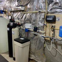 Water Treatment including a Solution Feeder, water softener, ultraviolet light for bacteria and a constant water pressure well pump system