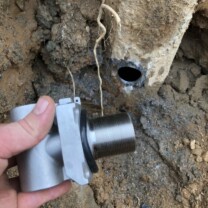 Trench, pipe and wire for a new well pump