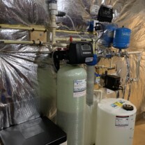Water Softener, a solution feeder, sediment filter and a constant water pressure system