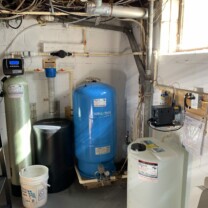 Solution feeder, water softener, sediment filter and pressure tank