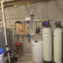 sediment filters, Solution feeder, a water softener, su,p pump, pressure tank and a carbon filter