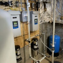 leak protection alarm, subdrive utility water pressure control boxes, pressure tank, sump pump, water storage and water pressure boosters.