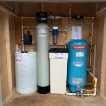 A Solution Feeder, water softener, a sediment filter and a pressure tank