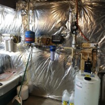 reverse osmosis, sediment filter, constant water pressure system and a solution feeder