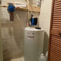 sediment filter and a solution feeder