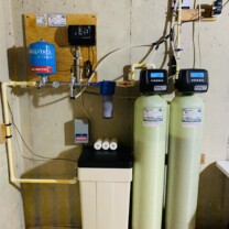 constant pressure system, sediment filter, water softener and an acid neutralizer