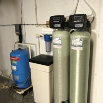 pressure tank, water softener, acid neutralizer and a sediment filter