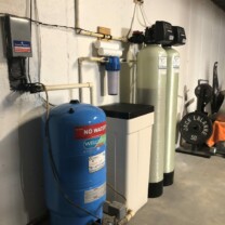 pressure tank, water softener, acid neutralizer and a sediment filter