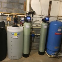 Chemical Feeder, Water Softener, multimedia, sediment filter and a pressure tank